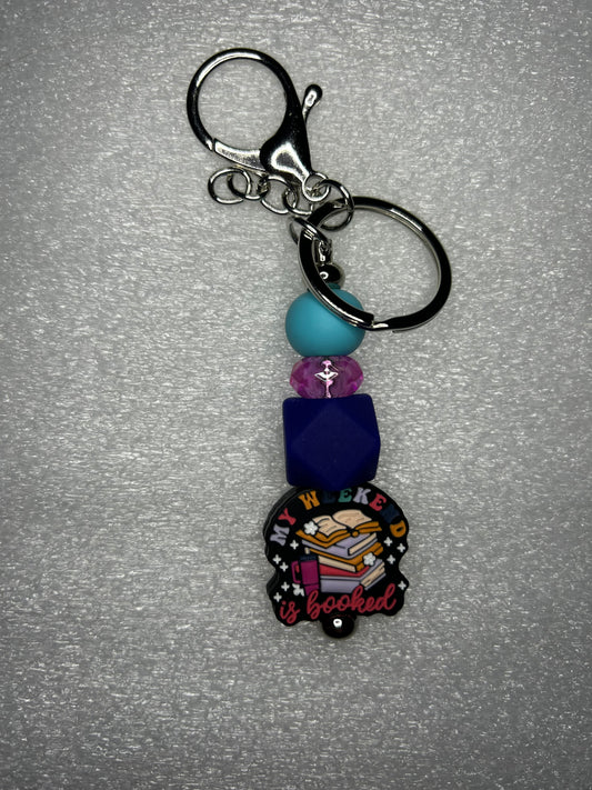 My weekends booked- keychain